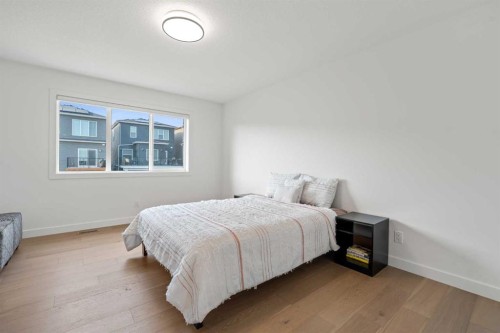 389 Crimson Ridge Place Nw, Calgary, AB - Indoor Photo Showing Bedroom