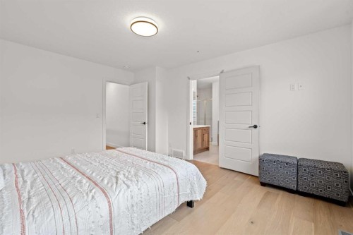 389 Crimson Ridge Place Nw, Calgary, AB - Indoor Photo Showing Bedroom