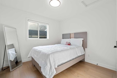 389 Crimson Ridge Place Nw, Calgary, AB - Indoor Photo Showing Bedroom