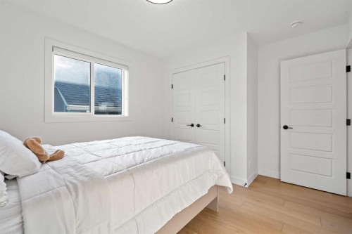 389 Crimson Ridge Place Nw, Calgary, AB - Indoor Photo Showing Bedroom