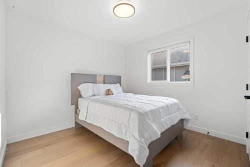 389 Crimson Ridge Place Nw, Calgary, AB - Indoor Photo Showing Bedroom