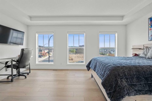 389 Crimson Ridge Place Nw, Calgary, AB - Indoor Photo Showing Bedroom