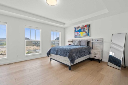 389 Crimson Ridge Place Nw, Calgary, AB - Indoor Photo Showing Bedroom