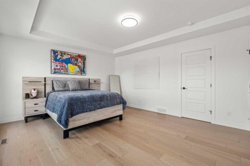 389 Crimson Ridge Place Nw, Calgary, AB - Indoor Photo Showing Bedroom