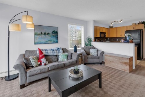 7201-70 Panamount Drive Nw, Calgary, AB - Indoor Photo Showing Living Room