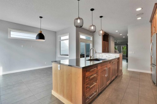 145 Marquis Common Se, Calgary, AB - Indoor Photo Showing Kitchen With Upgraded Kitchen