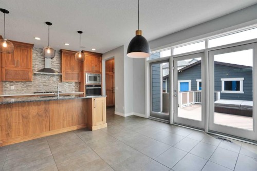 145 Marquis Common Se, Calgary, AB - Indoor Photo Showing Kitchen With Upgraded Kitchen