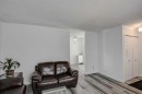 184 Erin Croft Crescent Se, Calgary, AB  - Indoor Photo Showing Living Room 