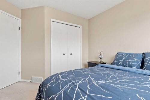 61 Mt Aberdeen Circle Se, Calgary, AB - Indoor Photo Showing Bedroom