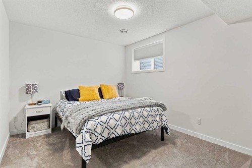 61 Mt Aberdeen Circle Se, Calgary, AB - Indoor Photo Showing Bedroom