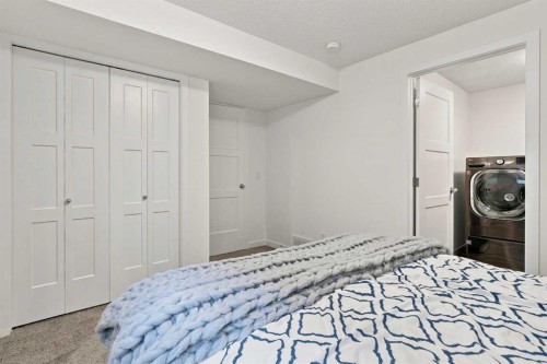 61 Mt Aberdeen Circle Se, Calgary, AB - Indoor Photo Showing Bedroom