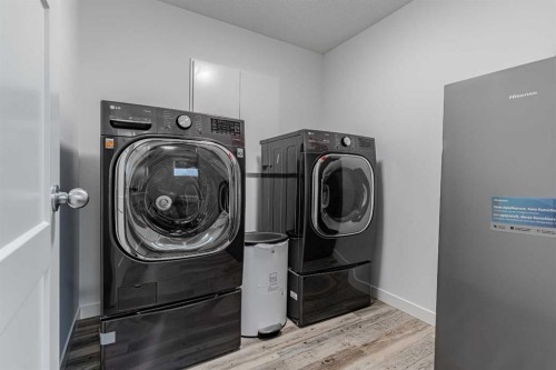 61 Mt Aberdeen Circle Se, Calgary, AB - Indoor Photo Showing Laundry Room