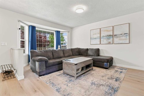 61 Mt Aberdeen Circle Se, Calgary, AB - Indoor Photo Showing Living Room