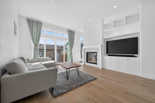 1704 26A Street Sw, Calgary, AB - Indoor Photo Showing Living Room With Fireplace