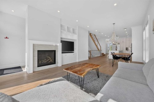 1704 26A Street Sw, Calgary, AB - Indoor Photo Showing Living Room With Fireplace