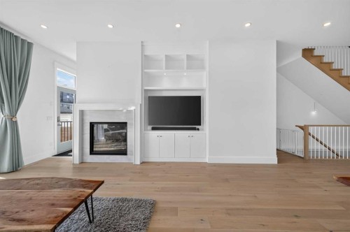1704 26A Street Sw, Calgary, AB - Indoor Photo Showing Living Room With Fireplace