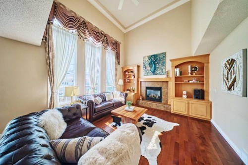 46 Hampstead Manor Nw, Calgary, AB - Indoor Photo Showing Living Room With Fireplace