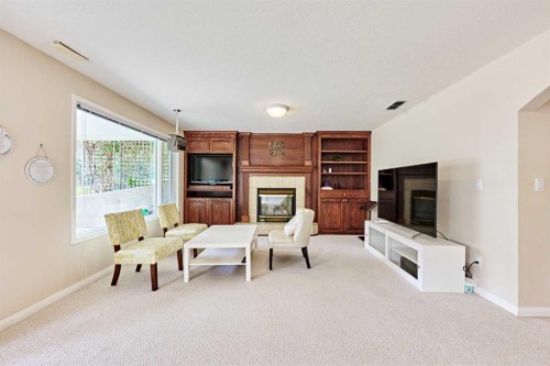 46 Hampstead Manor Nw, Calgary, AB - Indoor With Fireplace