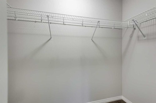 127 Prestwick Villas Se, Calgary, AB - Indoor With Storage