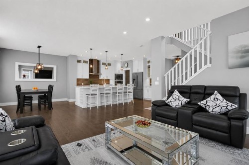 108 Kinniburgh Close, Chestermere, AB - Indoor Photo Showing Living Room