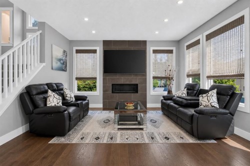 108 Kinniburgh Close, Chestermere, AB - Indoor Photo Showing Living Room With Fireplace