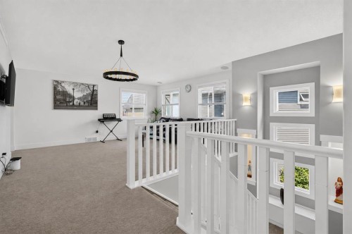 108 Kinniburgh Close, Chestermere, AB - Indoor Photo Showing Other Room
