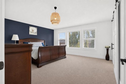 108 Kinniburgh Close, Chestermere, AB - Indoor Photo Showing Bedroom