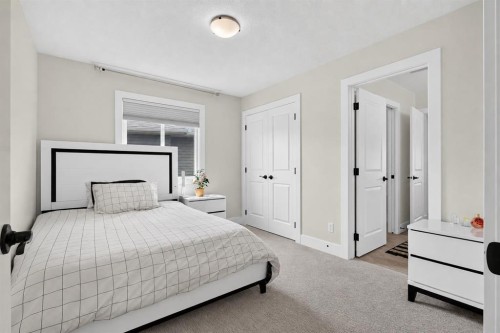 108 Kinniburgh Close, Chestermere, AB - Indoor Photo Showing Bedroom