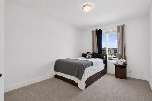 108 Kinniburgh Close, Chestermere, AB - Indoor Photo Showing Bedroom