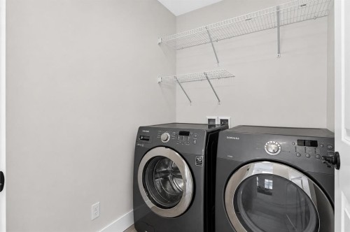 108 Kinniburgh Close, Chestermere, AB - Indoor Photo Showing Laundry Room