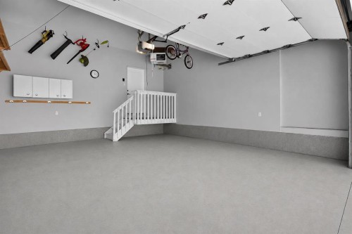 108 Kinniburgh Close, Chestermere, AB - Indoor Photo Showing Garage