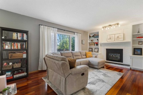 136 Harvest Hills Drive Ne, Calgary, AB - Indoor Photo Showing Living Room With Fireplace