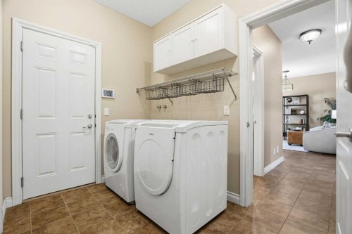 133 Aspen Stone Road Sw, Calgary, AB - Indoor Photo Showing Laundry Room