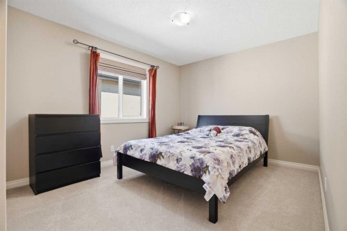133 Aspen Stone Road Sw, Calgary, AB - Indoor Photo Showing Bedroom