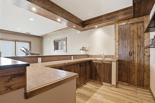 133 Aspen Stone Road Sw, Calgary, AB - Indoor Photo Showing Kitchen With Double Sink