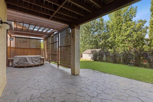133 Aspen Stone Road Sw, Calgary, AB - Outdoor With Deck Patio Veranda