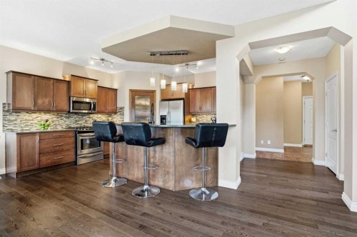 133 Aspen Stone Road Sw, Calgary, AB - Indoor Photo Showing Kitchen With Stainless Steel Kitchen With Upgraded Kitchen
