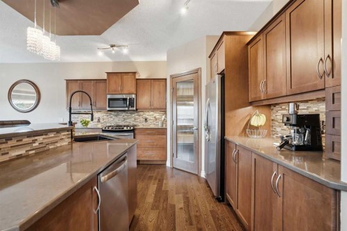 133 Aspen Stone Road Sw, Calgary, AB - Indoor Photo Showing Kitchen With Stainless Steel Kitchen With Upgraded Kitchen