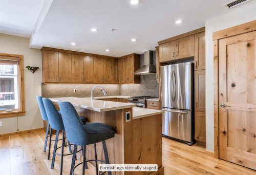 209-707 Spring Creek Drive, Canmore, AB - Indoor Photo Showing Kitchen