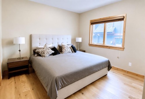 209-707 Spring Creek Drive, Canmore, AB - Indoor Photo Showing Bedroom