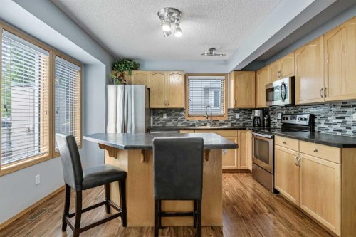 511 Killarney Glen Court Sw, Calgary, AB - Indoor Photo Showing Kitchen With Double Sink