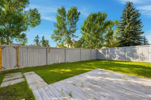 279 Coral Springs Circle Ne, Calgary, AB - Outdoor With Backyard