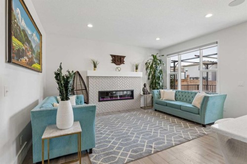 159 Belmont Terrace Sw, Calgary, AB - Indoor Photo Showing Other Room With Fireplace