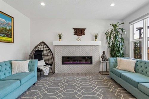 159 Belmont Terrace Sw, Calgary, AB - Indoor Photo Showing Living Room With Fireplace