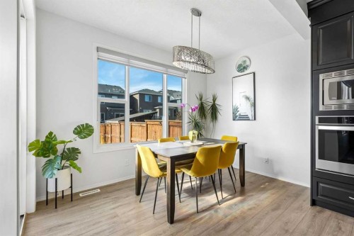 159 Belmont Terrace Sw, Calgary, AB - Indoor Photo Showing Dining Room