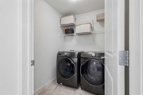 159 Belmont Terrace Sw, Calgary, AB - Indoor Photo Showing Laundry Room