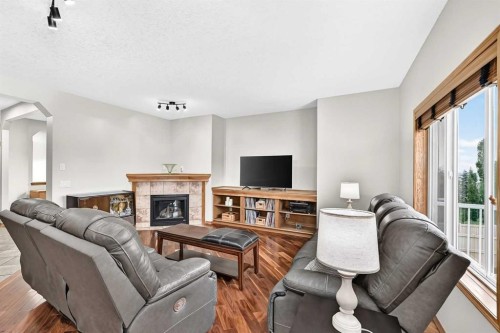 145 Panamount Place Nw, Calgary, AB - Indoor With Fireplace
