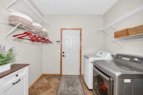145 Panamount Place Nw, Calgary, AB - Indoor Photo Showing Laundry Room