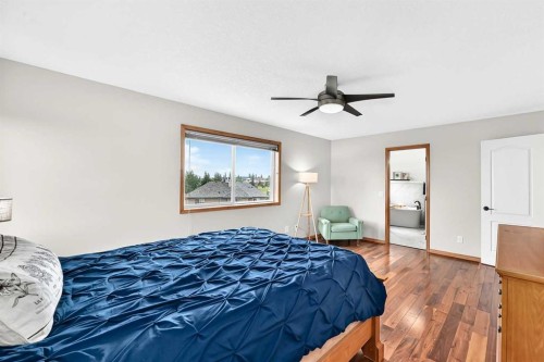 145 Panamount Place Nw, Calgary, AB - Indoor Photo Showing Bedroom