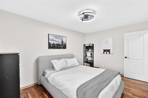145 Panamount Place Nw, Calgary, AB - Indoor Photo Showing Bedroom